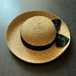 Beautiful sun hat with black fabric bow